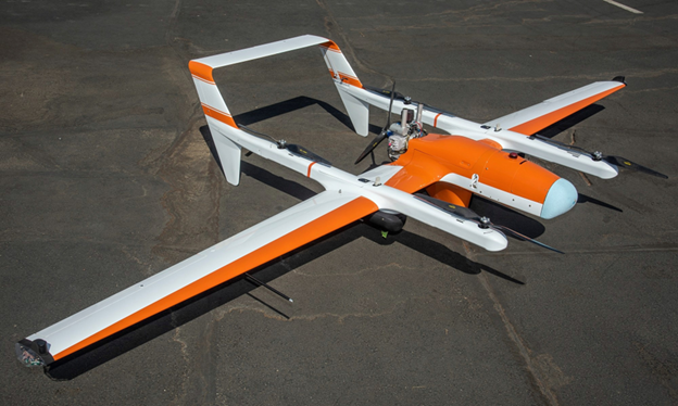 Figure 1. A roughly 54 kg remotely piloted VTOL with a 4.7 m wingspan shows the physical scale at which power distribution becomes an aircraft-integration problem. The HQ-90 is hybrid-powered and is shown only for scale; this photograph does not establish its battery or bus topology. Photo: NASA / Ken Ulbrich.